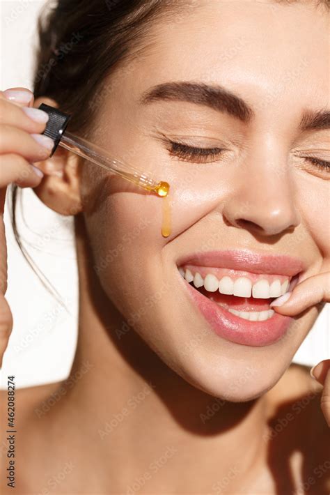 Closeup Photo Of Beautiful Naked Lady Hold Professional Cure Serum Bottle Oil Treatment