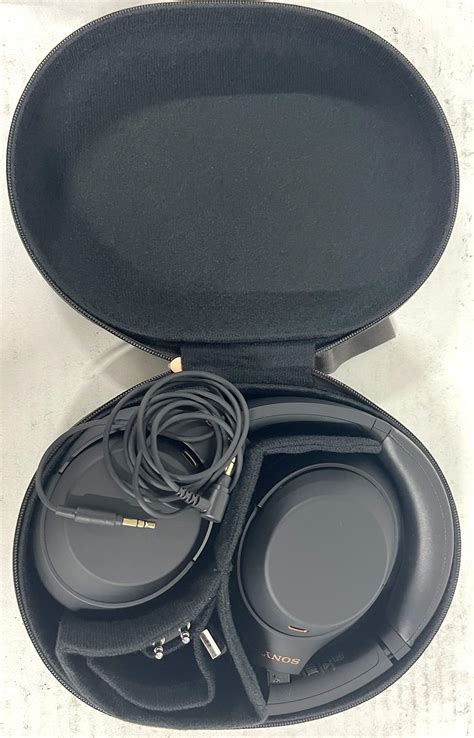 Lot - A pair of wireless Sony over-ear headphones & case