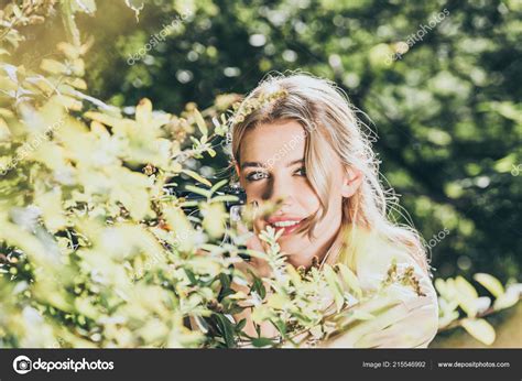 obscured view woman photo camera park stock photo  igorvetushko