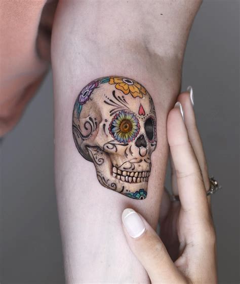 Small Sugar Skull Tattoo Behind The Ear