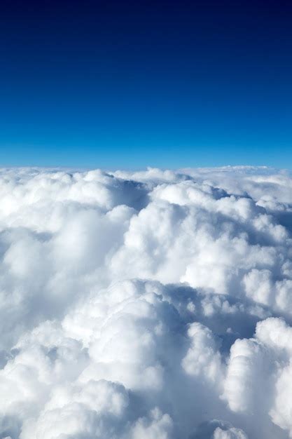 Premium Photo Clouds A View From Airplane Window