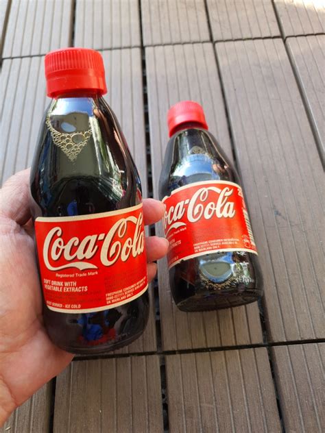 coke bottle food drinks beverages  carousell