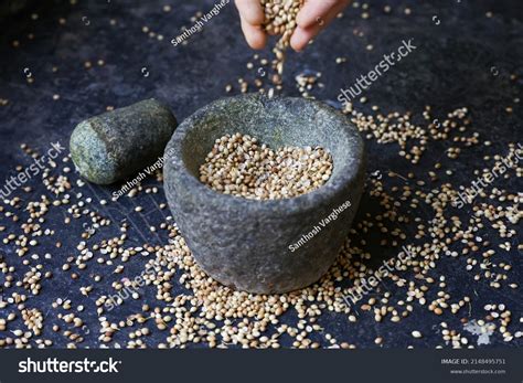 Indian Woman Hand Powdering Indian Spices Stock Photo