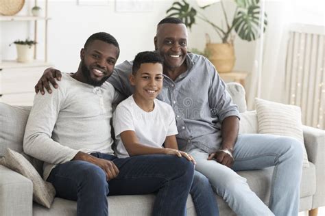 Mature African American Man Posing At Home With Son And Grandson Stock Photo Image Of Black