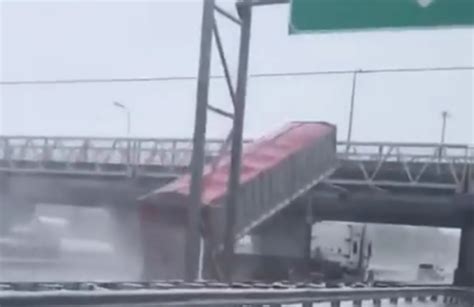 Dump Truck With Bed Raised Slams Into Overpass Video