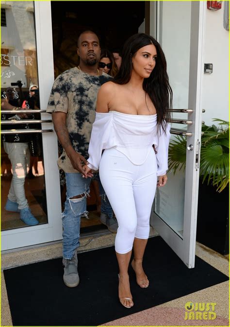 Kim Kardashian Flaunts Curves And Cleavage In White Jumpsuit Photo