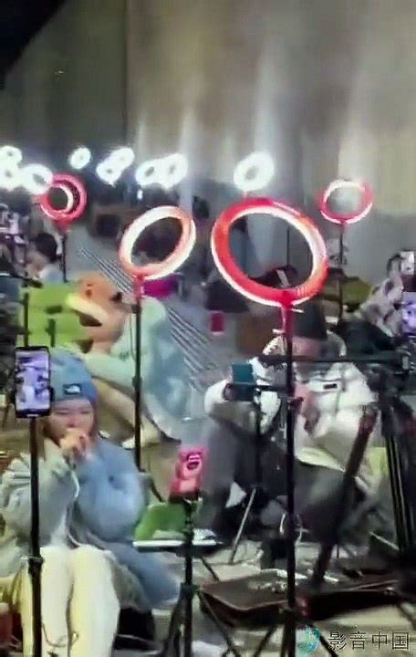 Dystopian Viral Video Shows Dozens Of Chinese Streamers Under A Bridge Trying To “game The