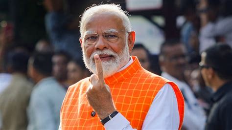 Watch Pm Narendra Modi Casts His Vote At Ahmedabad School Urges