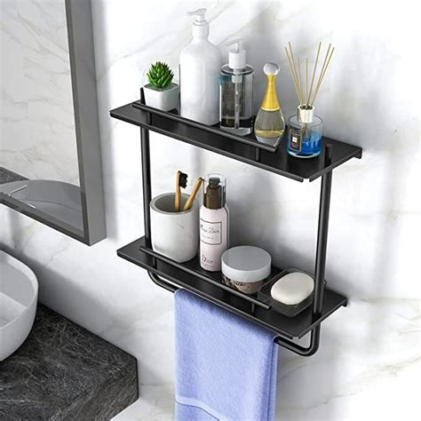 a bathroom shelf with soap, toothbrushes and other personal care items ...