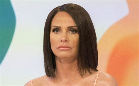 Katie Price Barely Conceals Her Ample Assets As She Splashes Around Topless In A Hot Tub For