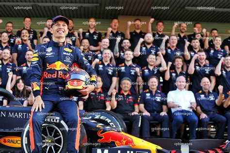 Alexander Albon Tha Red Bull Racing At A Team Photograph