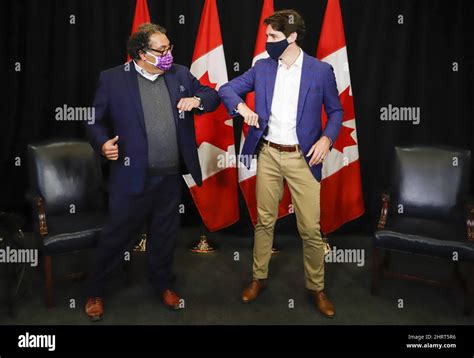 Prime Minister Justin Trudeau Right Elbow Bumps With Calgary Mayor