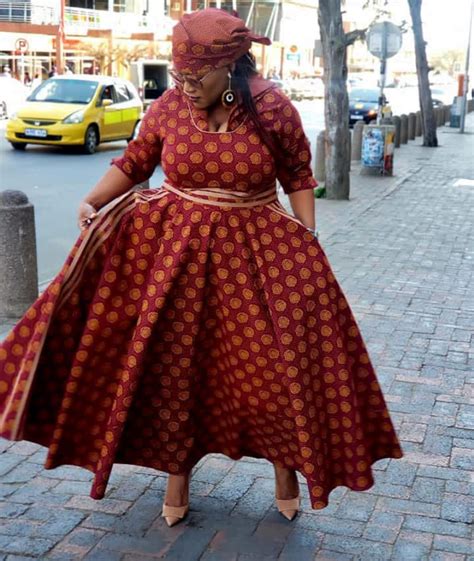 Clipkulture Lady In Brown Shweshwe Gathered Dress And Headwrap