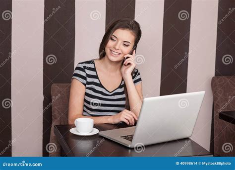 Pretty Brunette Talking On Phone In Cafe Stock Photo Image Of Cell Buildings