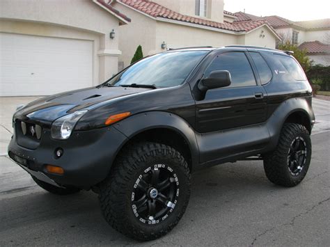 Black SUV Parked in Front of a House