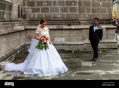 A Filipino Couple Pose For Wedding Photos Outside A Church In Intramuros Manila The