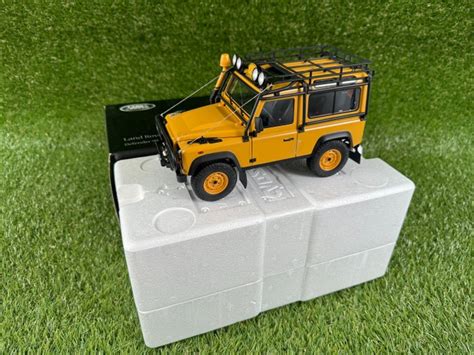 Kyosho Modelauto Land Rover Defender Geel Catawiki