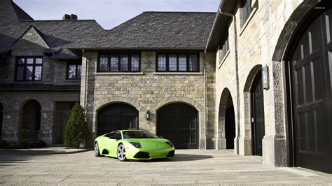 Green Lamborghini Murcielago Parked In Front Of A Mansion Wallpaper