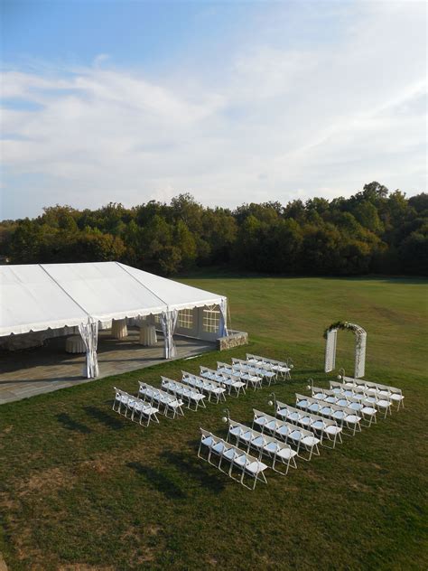 Outdoor Wedding Ceremony Under White Tent