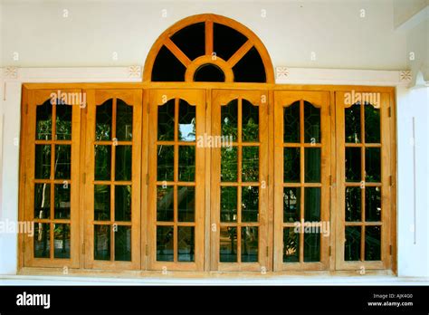 The glass windows of a modern house with a wooden framework Stock Photo - Alamy