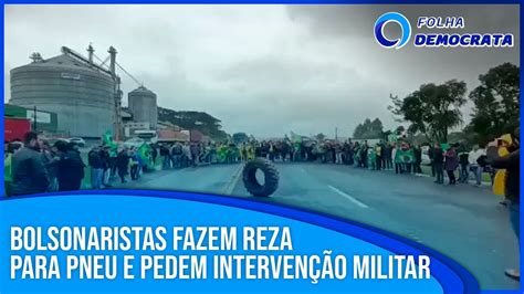 BOLSONARISTAS cantam HINO NACIONAL para PNEU e pedem INTERVENÇÃO