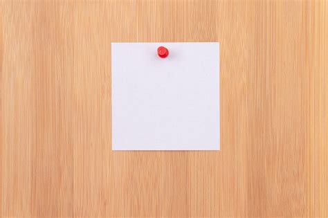 Premium Photo White Sticky Note Pinned To The Wooden Message Board