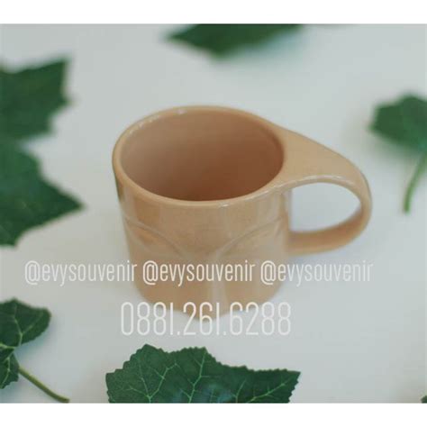 souvenir mug motif evy souvenir