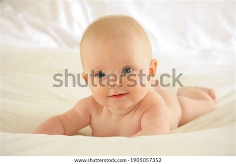Happy Naked Baby On Bed Stock Photo Shutterstock
