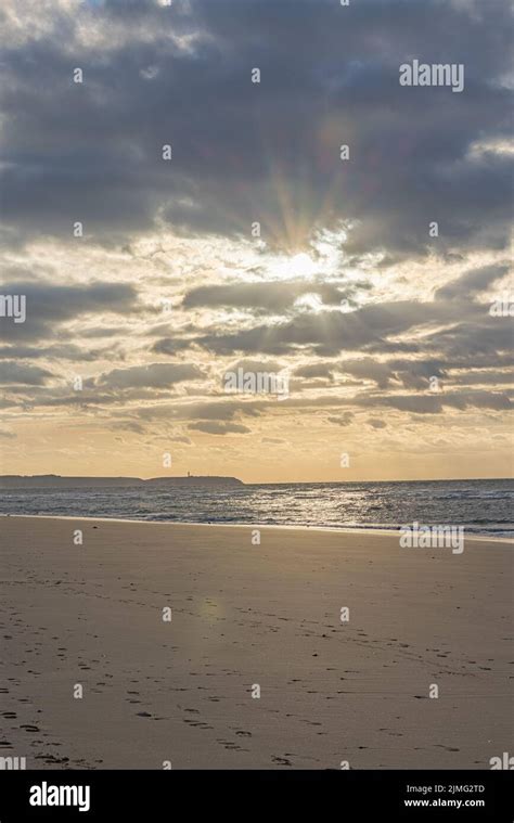 Amazing Colorful Sunset On A Sandy Beach At The Sea Under A Sky Painted