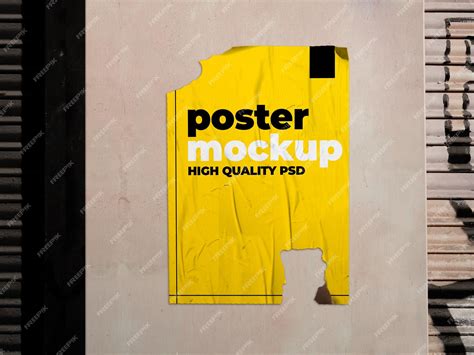 Premium PSD | Mockup of a ripped poster on a grunge wall