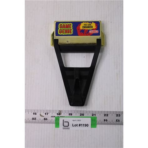 Nintendo NES Game Genie - Bodnarus Auctioneering