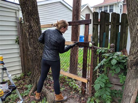 Attaching a wood fence to a chainlink fence | And Then We Tried