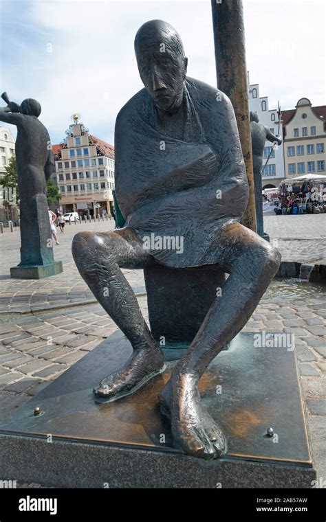 Sculptures In Neuer Markt Square Rostock Stock Photo Alamy