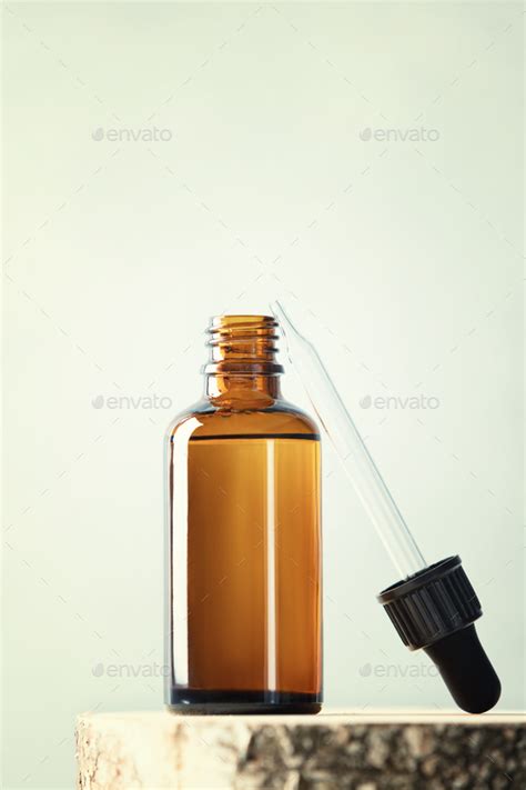 Blank Transparent Amber Glass Essential Oil Bottle With Pipette Stock