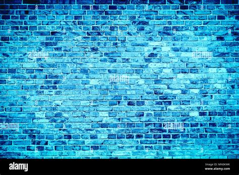 Blue Brick Wall Painted With Different Tones And Hues Of Blue As