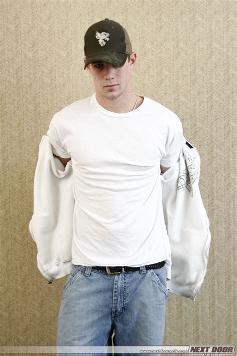 Horny Gay With A Cap Mario Unveils His Hot Ass And Poses On A Bed CoedCherry