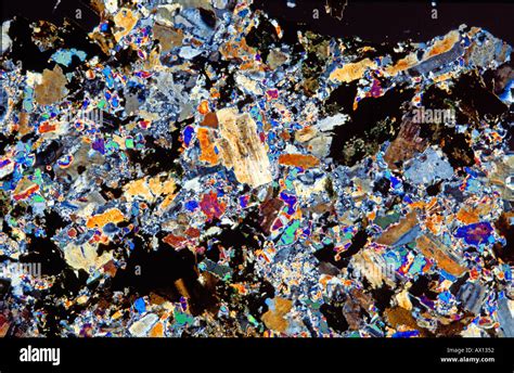 Hornblende Granite Rock thin section showing minerals through cross polarized light Stock Photo ...