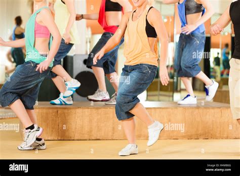 Zumba Or Jazzdance Young People Dancing In Studio Stock Photo Alamy