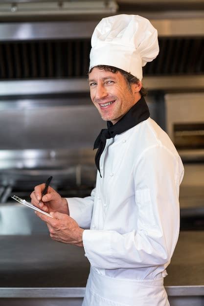 Premium Photo Portrait Of Happy Male Chef In Kitchen