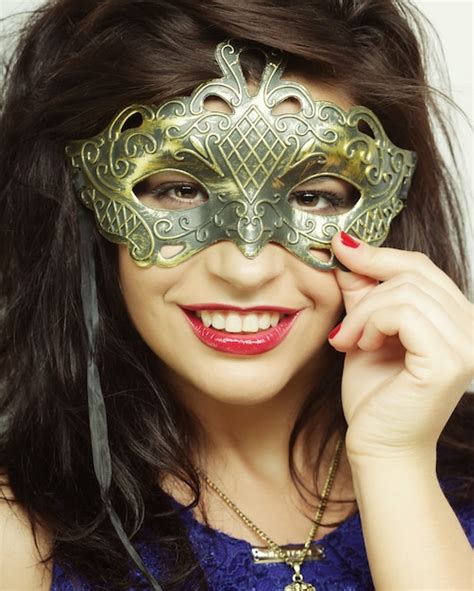 Premium Photo Young Woman With Mysterious Mask