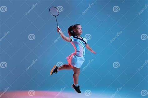 Beautiful Dwarf Woman Practicing In Badminton Isolated On Blue