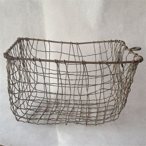 Metal Wire Storage Basket from paulcorrieinteriorshome on Ruby Lane