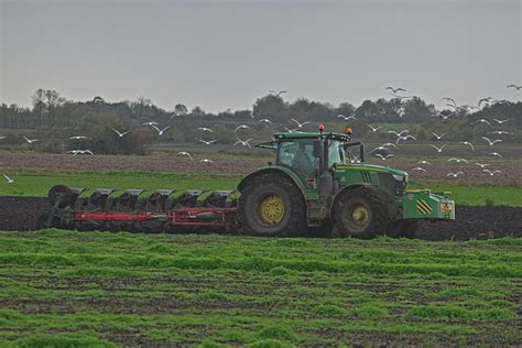 John Deere 6215R Ploughing Photograph By Simpson Photography