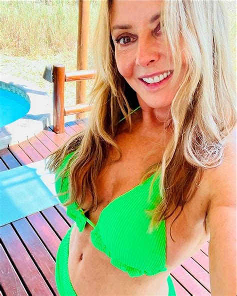 I M A Celeb Carol Vorderman S Hottest Bikini Snaps Plunging Displays And Steamy Showers