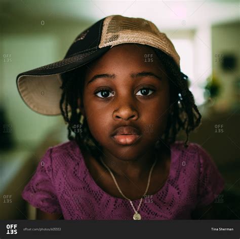 Girl Wearing A Sideways Ball Cap Stock Photo Offset