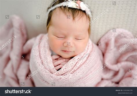 Cute Newborn Baby Girl Sleeping Swaddled Stock Photo 2101361779