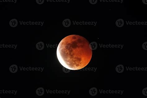 The Lunar Eclipse. Photographed blood moon 14285210 Stock Photo at Vecteezy