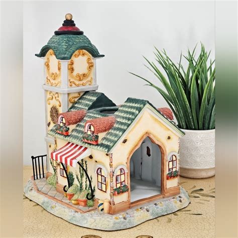 A Partylite Exclusive Holiday Vintage Clock Tower Porcelain Old