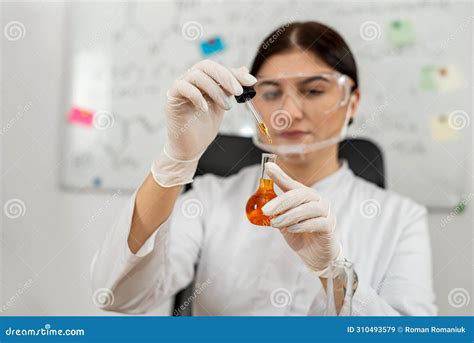 Laboratory Assistant Mixed Liquid In Test Tube With Pipette Research