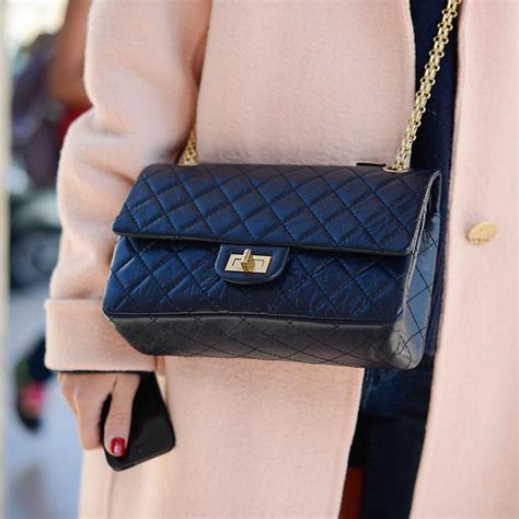 The History Of The Chanel 255 Flap Bag Luxfy